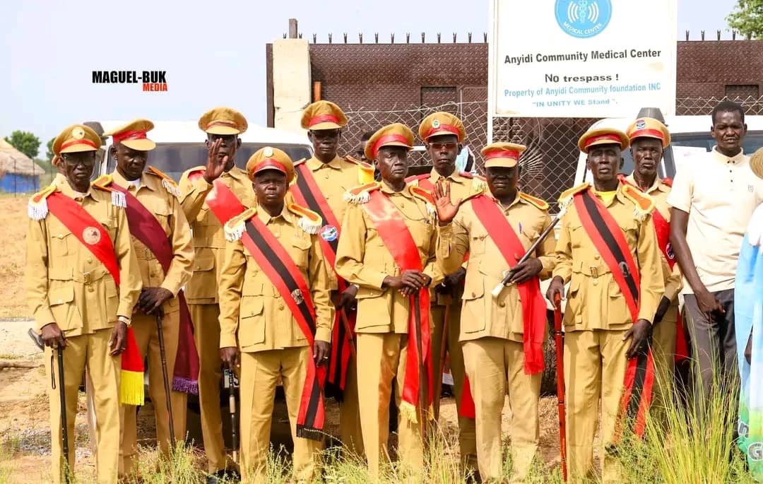 Group of community leaders in ceremonial clothing