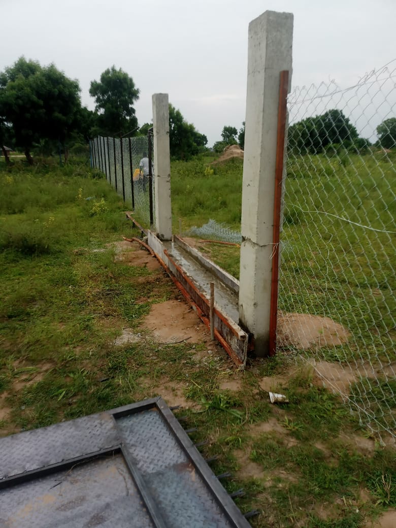 Fence construction at the community project site
