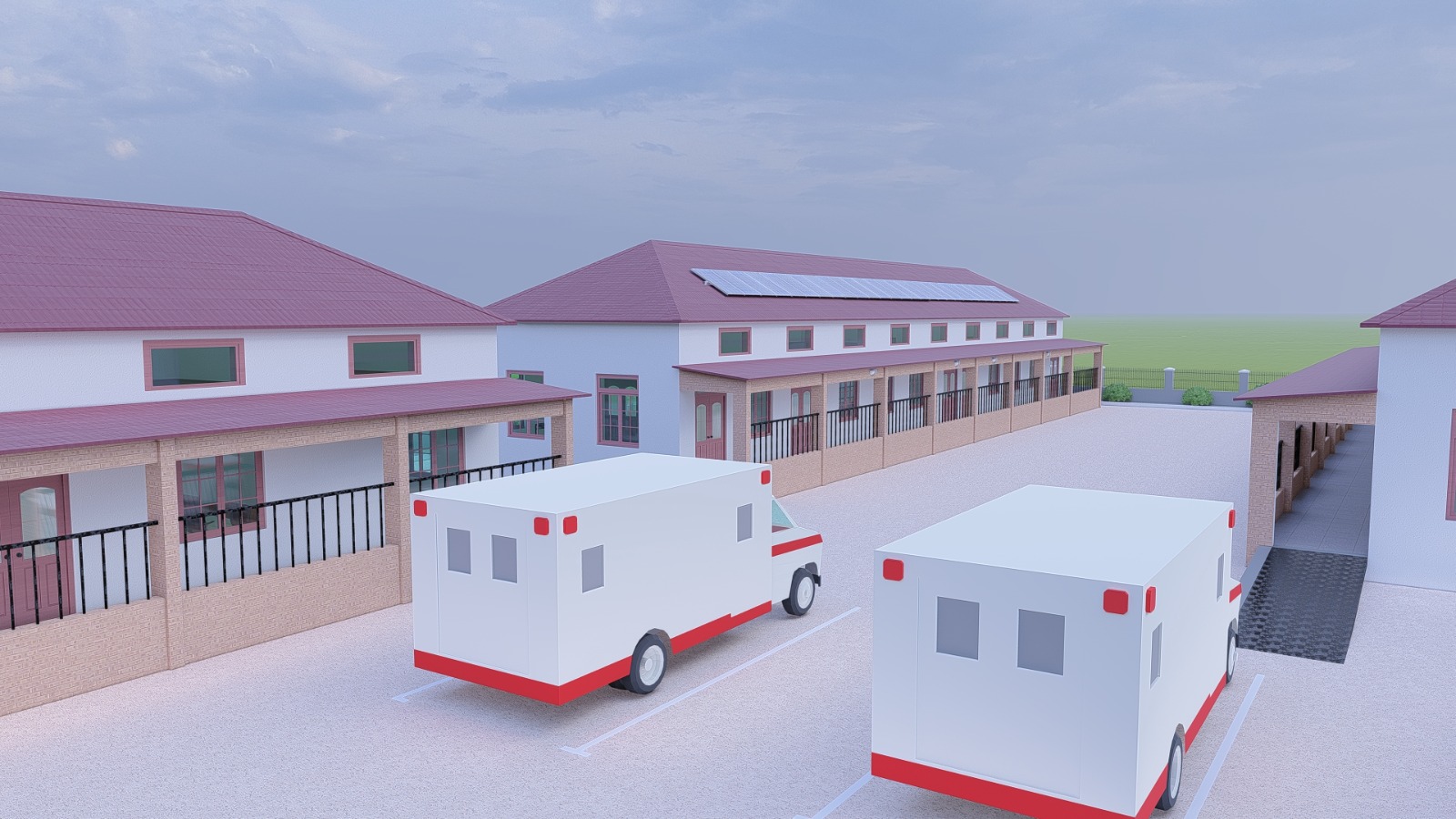 Architectural rendering showing medical center buildings and ambulances